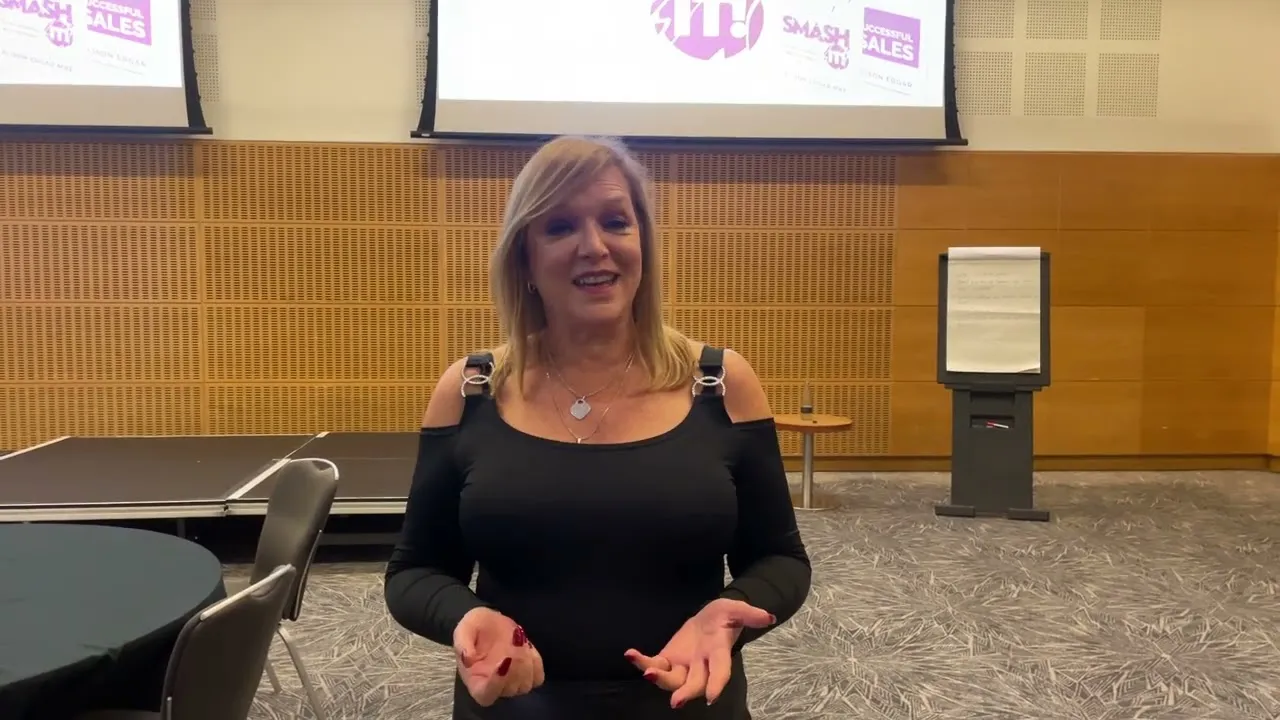 A member of the Cambridge 1:1 Diet team speaking to camera in the conference room after Alison’s session.